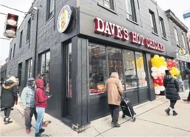  ?? RICHARD LAUTENS TORONTO STAR ?? California chain Dave’s Hot Chicken recently opened up in Parkdale, its first location in Canada. Two more locations are scheduled to open in Toronto this year, one at Yonge and Eglinton and another in Leslievill­e.