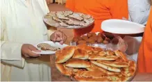  ??  ?? Snacks being served at parliament­ary candidates headquarte­rs.