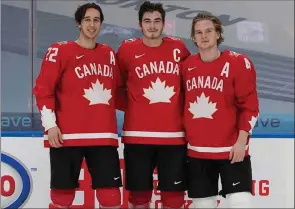  ?? Hockey Canada ?? Team Canada’s Kirby Dach, centre, Dylan Cozens, left, and Bowen Byram were named captains for the world juniors.