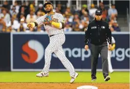  ?? K.C. ALFRED U-T ?? Robinson Cano fields a ball by Brewers’ Andrew McCutchen in the second inning.