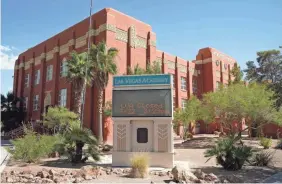  ?? JOHN LOCHER/AP ?? A sign shows Las Vegas Academy is closed July 22 in Las Vegas. Clark County school trustees cited fears of spreading the coronaviru­s and unanimousl­y decided to begin the 2020-21 school year using distance education.