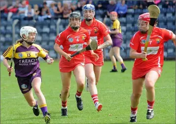  ??  ?? Linda Bolger applying pressure on the Cork defence during Saturday’s one-sided encounter.