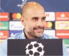  ??  ?? Pep Guardiola addresses a press conference on the eve of the UEFA Champions League Group F match against TSG 1899 Hoffenheim in Walldorf, near Heidelberg southern Germany. — AFP photo