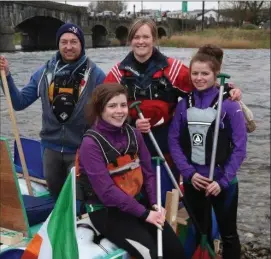  ??  ?? The Blackwater Bandits from Kilavullen getting ready to set sail for home from Mallow Bridge at the start of the 2016 raft run. Photo: Sheila Fitzgerald