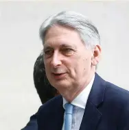  ?? (Henry Nicholls/Reuters) ?? BRITAIN’S CHANCELLOR of the Exchequer Philip Hammond arrives yesterday at the BBC studios in London.