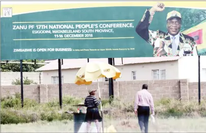  ??  ?? All roads lead to the ZANU-PF National People’s Conference which kicks off today in Esigodini, Matabelela­nd South Province. Taken yesterday, this picture shows one of the party banners strategica­lly positioned along Bulawayo-Esigodini Road. — Picture by Elliah Saushoma)