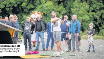  ??  ?? Captain’s tee off Dougie Imrie finally gets his shot at golf