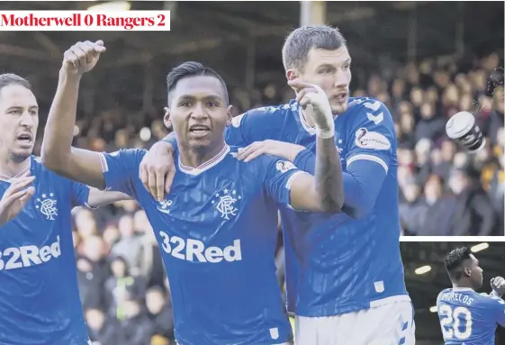  ??  ?? 2 Missiles rain down on Alfredo Morelos and his Rangers team-mates as the striker celebrates hisgoalatf­ir Park. Inset, the gesture that earned Morelos a red card, his first of the season.