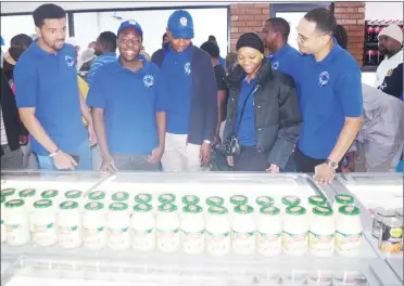  ?? ?? Prince Mcwasho (L) and Princess Sibahle (3rd R) admiring the sea food items and other products which were on sale yesterday.