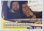  ??  ?? GRATEFUL John & Sinead in Garda car on Thursday