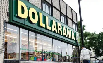  ?? PAUL CHIASSON/THE CANADIAN PRESS ?? Despite prices rising, Dollarama earned $133.5 million in its latest quarter, up from $130.1 million a year ago.