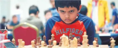  ?? // ANASTASIA KARLOVICH / FIDE ?? Abhimanyu Mishra y su mirada más caracterís­tica, probableme­nte inspirada por Kasparov