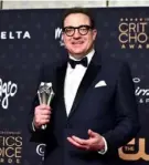  ?? Jordan Strauss/Invision/AP ?? Brendan Fraser poses Sunday with the award for best actor for “The Whale” at the Critics Choice Awards at The Fairmont Century Plaza Hotel in Los Angeles.