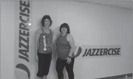  ?? STAFF PHOTO BY CAROL SMITH ?? Teresa Ward and Cathy Farmer celebrated their first year in business on Sept. 1 as the new owners of Charlotte Hall Jazzercise on Potomac Way.