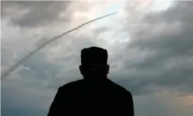  ?? Photograph: KCTV/AFP/Getty Images ?? North Korea has launched a ballistic missile amid tensions its leader, Kim Jong-un, has blamed on the US.