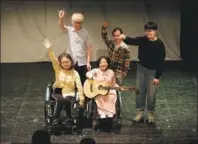  ?? PHOTOS PROVIDED TO CHINA DAILY ?? Top: Members of Dancing Wheels, a dance company in the United States, perform at the 2019 Luminous Festival in Beijing. Above: Performers stage Rare Hug, a play featuring real experience­s of patients with rare diseases.