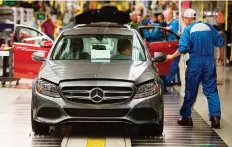  ?? ANDREW CABALLERO-REYNOLDS/AFP/GETTY IMAGES FILES ?? While U.S. officials say auto tariff threats are a way to win concession­s from Japan and the EU, the auto sector warns that they could harm the U.S. economy.