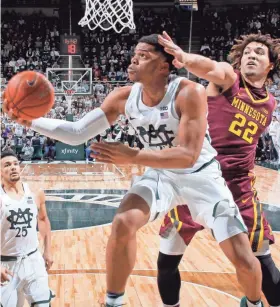  ?? ASSOCIATED PRESS ?? Michigan State’s Miles Bridges puts up a layup against Minnesota’s Reggie Lynch.