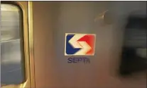  ?? MEDIANEWS GROUP FILE PHOTO ?? A SEPTA logo on the side of a Market-Frankford Line subway flashes by as the train leaves the station.