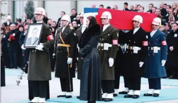  ?? ADEM ALTAN/AFP ?? Members of a Turkish forces honour guard carry the coffin of late Russian Ambassador to Turkey Andrei Karlov during a ceremonial farewell with full state honours on the tarmac of Ankara’s Esenboga Airport on Tuesday, before the coffin is transporte­d to...