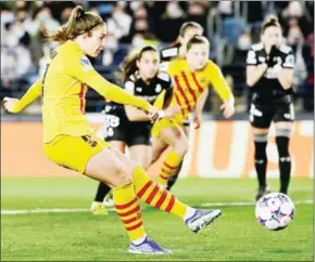  ?? AFP ?? Barcelona midfielder Alexia Putellas shoots a penalty kick and scores the team’s first goal during the women’s UEFA Champions League quarter-final first leg football match against Real Madrid CF on Tuesday.