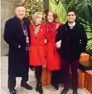  ?? ?? The author (second from right) and her stepmother in their red coats