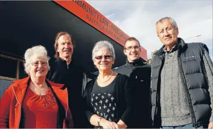  ?? Photo: MARION VAN DIJK/FAIRFAX NZ ?? Free legal service: From left, Judith McColl, receptioni­st, Peter Riley, managing solicitor, Margaret Thomson, law worker, Jim Ennion, state solicitor, and Tui Hammond, law worker, outside the new Community Law location in Collingwoo­d St.