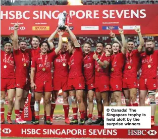  ??  ?? O Canada! The Singapore trophy is held aloft by the surprise winners