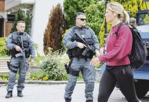  ?? PHOTO: REUTERS ?? Kosovo special police forces guard municipal offices yesterday, after Serb protesters prevented a newly elected ethnic Albanian mayor from entering the office in Zvecan, in Leposavic, Kosovo.