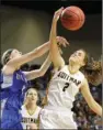  ?? FILE PHOTO ?? Hector’s Darci Fountain, left, and Quitman’s Aspen Johnson, right, battle for a rebound during their state championsh­ip game.