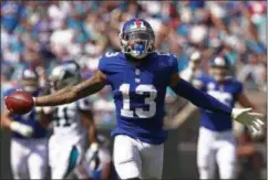  ?? JASON E. MICZEK- THE ASSOCIATED PRESS ?? FILE - In this Oct. 7, 2018, file photo, New York Giants’ Odell Beckham Jr. celebrates a catch against the Carolina Panthers during the first half of an NFL football game in Charlotte, N.C.