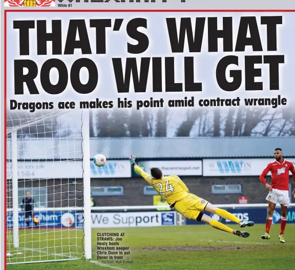  ?? PICTURE: Matt Bristow ?? CLUTCHING AT STRAWS: Joe Healy beats Wrexham keeper Chris Dunn to put Dover in front