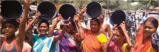  ??  ?? Women carrying empty buckets stage a demonstrat­ion against water scarcity, in Patna on June 15, 2019. (Photo: IANS)