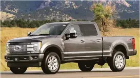  ??  ?? For 2017, the revamped Ford Super Duty gets the bigger cab of the F-150. The aluminum-bodied heavy-duty hauler starts at $33,730.