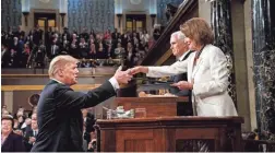  ?? GETTY IMAGES ?? President Donald Trump greets House Speaker Nancy Pelosi, alongside Vice President Mike Pence, at the State of the Union address Tuesday.