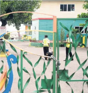  ?? FILE ?? Security guards contracted by the UDC patrol the grounds of the Aqua Sol Beach Park in Montego Bay, St James, last Thursday. Security guards are among thousands of Jamaican workers who are considered contract workers, with limited labour benefits.