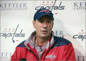  ?? MANUEL BALCE CENETA — THE ASSOCIATED PRESS FILE ?? In this file photo, Washington Capitals assistant coach Todd Reirden speaks to reporters during the first day of NHL hockey training camp in Arlington, Va. The Stanley Cupchampio­n Capitals have promoted Reirden to head coach to replace Barry Trotz.