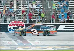  ?? RAY CARLIN/AP PHOTO ?? Austin Dillon crosses the finish line to win the NASCAR Cup Series auto race at Texas Motor Speedway on Sunday in Fort Worth, Texas.