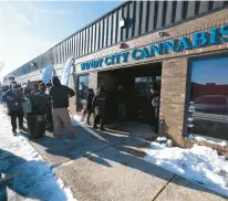  ?? GARY MIDDENDORF/DAILY SOUTHTOWN ?? Customers line up outside Windy City Cannabis in Homewood to purchase marijuana on Jan. 1, 2020, when recreation­al sales in Illinois became legal. Experts say both adult use and medical cannabis dispensari­es will feel the pinch of federal regulation­s on Monday, the deadline for filing income tax returns.