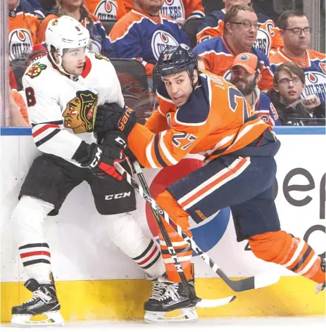  ?? | JASON FRANSON/ AP ?? With the injury to Artem Anisimov, coach Joel Quennevill­e moved Nick Schmaltz ( 8) back to center for the game against the Oilers.