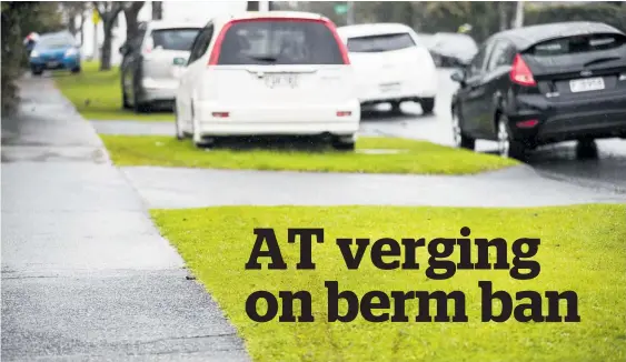  ?? Photo / Michael Craig ?? Auckland Transport wants a law change allowing it to fine people for parking on grass roadside berms that don’t have “no parking” signs.