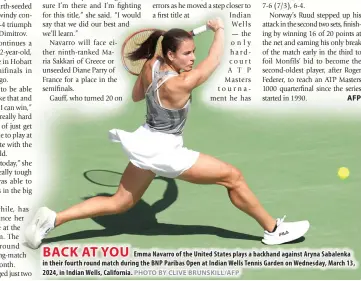  ?? PHOTO BY CLIVE BRUNSKILL/AFP ?? BACK AT YOU
Emma Navarro of the United States plays a backhand against Aryna Sabalenka in their fourth round match during the BNP Paribas Open at Indian Wells Tennis Garden on Wednesday, March 13, 2024, in Indian Wells, California.