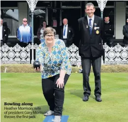  ??  ?? Bowling along
Heather Morrison, wife of president Gary Morrison, throws the first jack