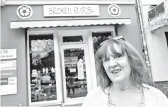  ??  ?? Carr, poses in front of her shop ‘Broken English’ shop, which sells British goods in Berlin’s leafy district of Kreuzberg. — AFP photo