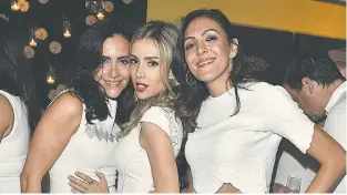  ??  ?? Michela Guglietti, Fernanda Dovigi and Melissa Baldassarr­a attend the White Party