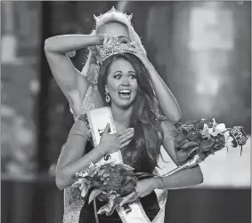  ?? NOAH K. MURRAY, FILE/AP PHOTO ?? In this Sept. 10, 2017, file photo, Miss North Dakota Cara Mund reacts after being named Miss America during the Miss America 2018 pageant in Atlantic City, N.J.