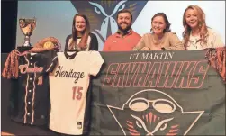  ?? Scott Herpst ?? Among those on hand to witness Heritage senior Mallory Lowe sign on to play at softball at Tennessee-martin were Heritage assistant coach Megan Crawford, Heritage head coach Tanner Moore and Heritage assistant coach Courtney Crawford.