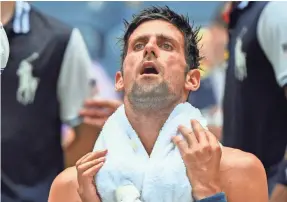  ?? ROBERT DEUTSCH/USA TODAY SPORTS ?? Novak Djokovic copes with the extreme heat while playing Marton Fucsovics in a first-round match Tuesday.