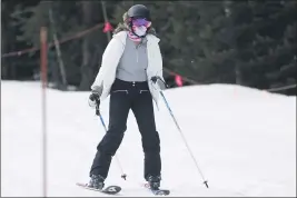  ?? DAVID ZALUBOWSKI — THE ASSOCIATED PRESS FILE ?? On May 27, a skier wears a face covering while negotiatin­g the slope at the reopening of Arapahoe Basin Ski Resort in Keystone, Colo.