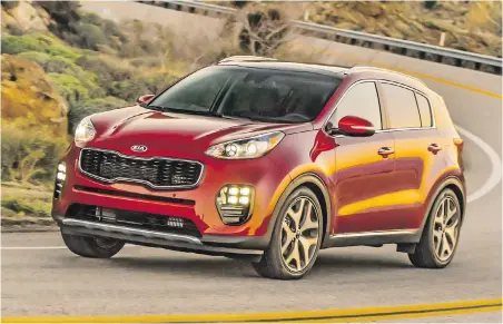  ??  ?? The new Kia Sportage’s grille is now separate from the headlights, giving the front a broader look.